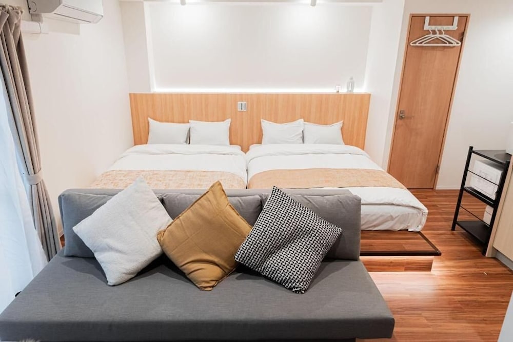 シニア アパートメント ベッド (複数台) シティビュー 客室2 | SAIEI HOTEL
