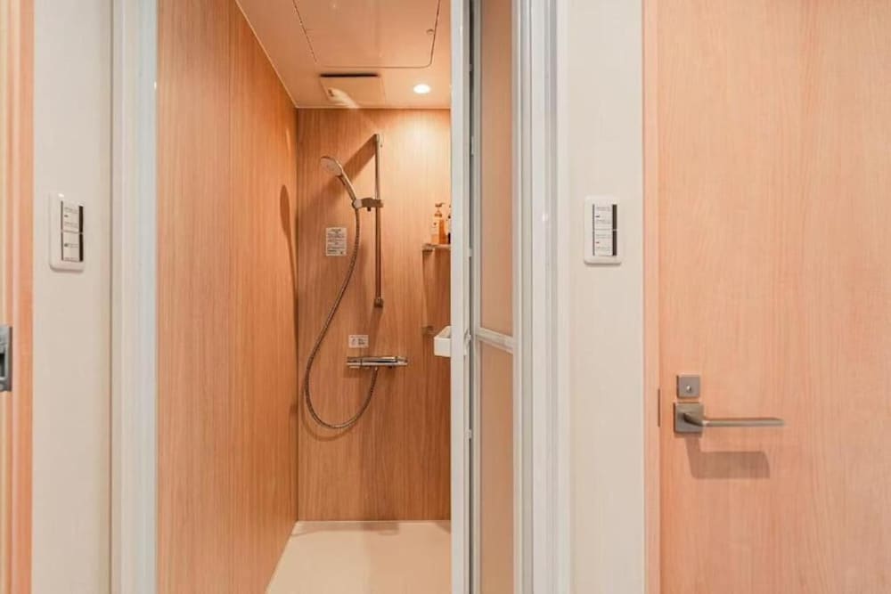 スタンダード アパートメント ベッド (複数台) シティビュー バスルーム5 | SAIEI HOTEL