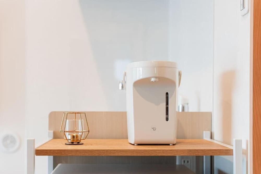 スタンダード アパートメント ベッド (複数台) シティビュー 客室2 | SAIEI HOTEL