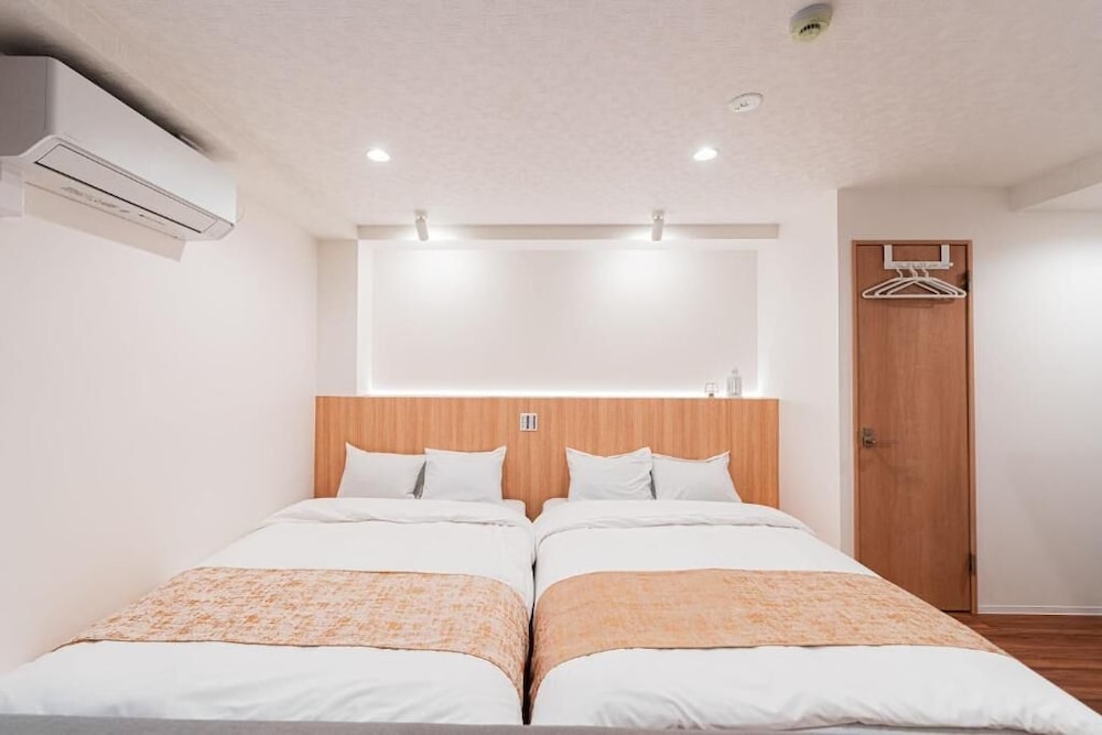 シニア アパートメント ベッド (複数台) シティビュー | SAIEI HOTEL