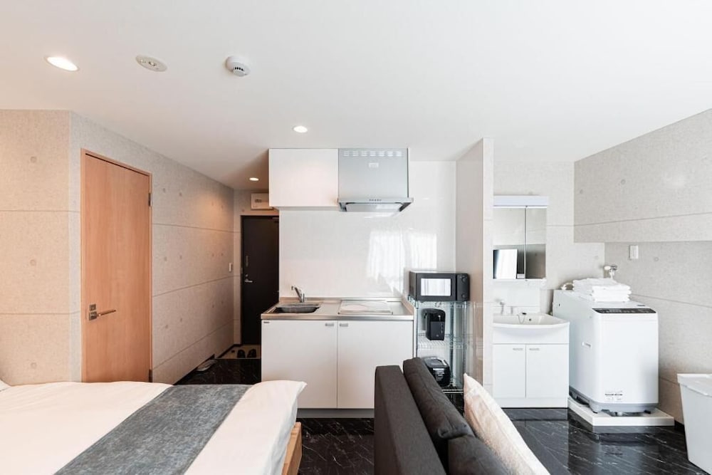 ベーシック アパートメント リビング エリア1 | SAIEI HOTEL