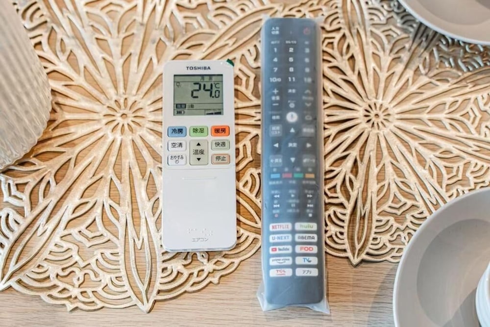 スタンダード アパートメント ベッド (複数台) シティビュー リビング エリア1 | SAIEI HOTEL