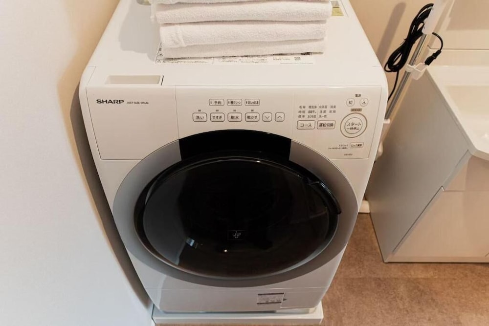 スタンダード アパートメント ベッド (複数台) シティビュー バスルーム2 | SAIEI HOTEL