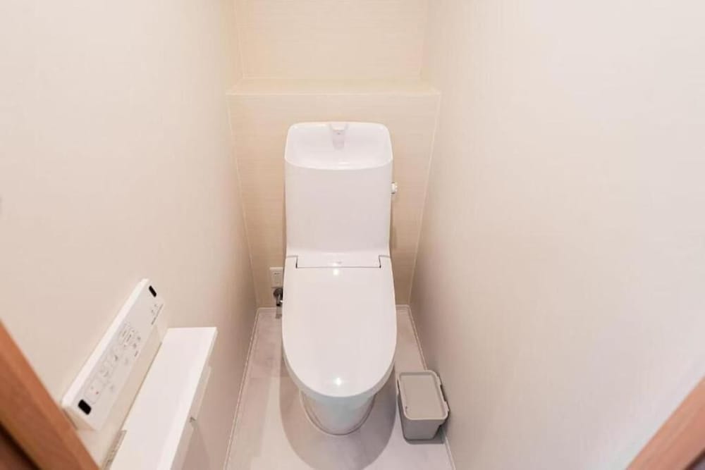 スタンダード アパートメント ベッド (複数台) シティビュー バスルーム3 | SAIEI HOTEL