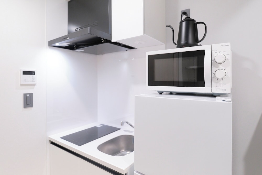 302/Non-smoking/2ppl 専用キッチン0 | RIZOTIA HAKUSAN by Tranova