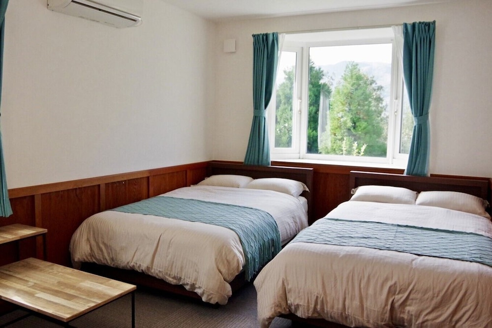 スタンダード ツインルーム 禁煙 マウンテンビュー (共用シャワー＆トイレ) | 個室ゲストハウス オルサみなみあそ