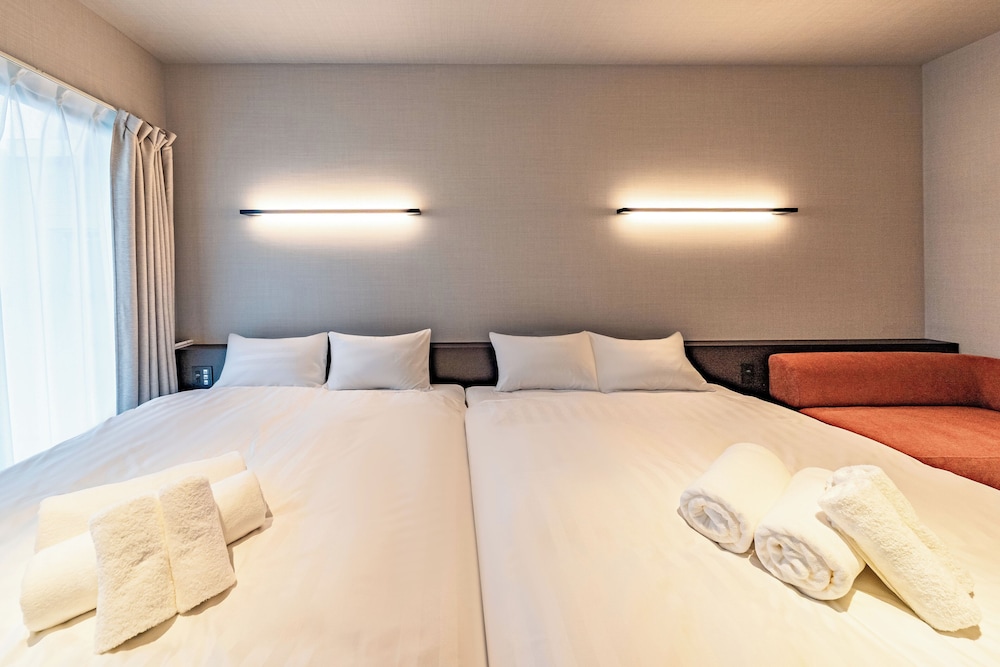 4 人部屋 禁煙 バルコニー 客室3 | Apartment Hotel 11 Miyakojima