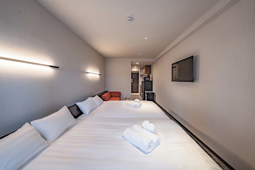 4 人部屋 禁煙 バルコニー 客室1 | Apartment Hotel 11 Miyakojima