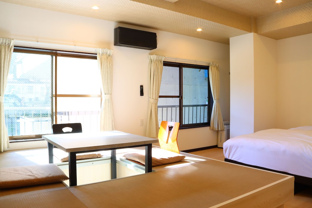 ツインベッドの和洋室 (BTなし) 禁煙 客室3 | 湯治の宿 妙見館