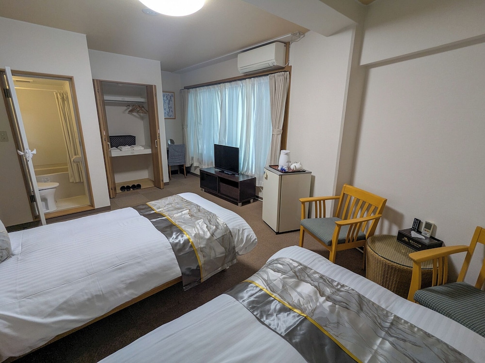 ベーシック ツインルーム シングルベッド 2 台 禁煙 | 富士たから荘 旭日館