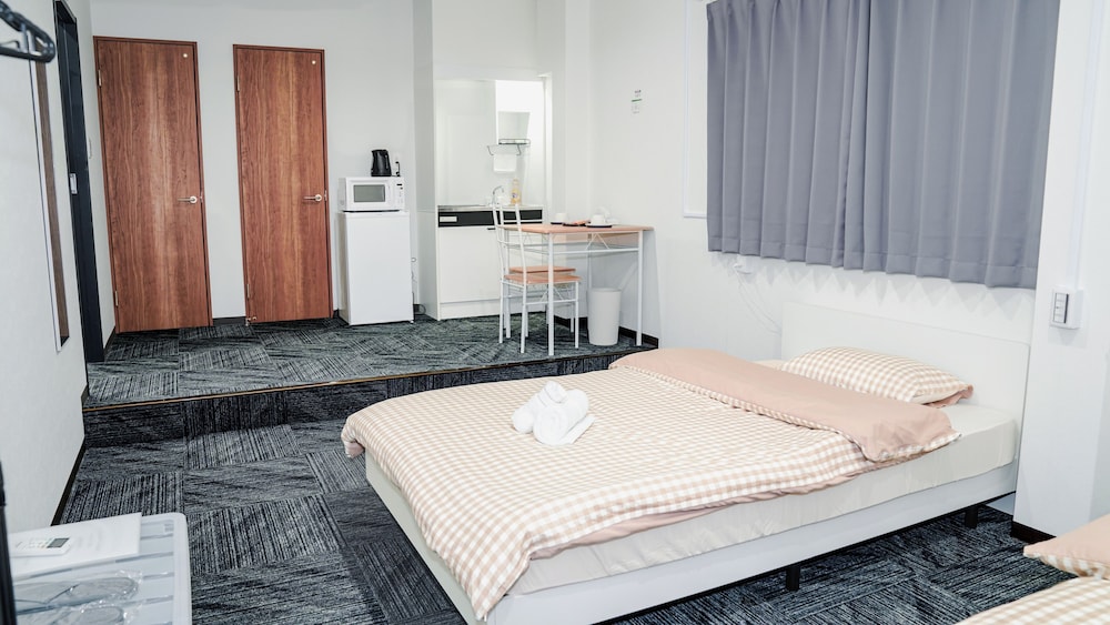 スーペリア ダブルルーム シングルベッド 2 台 禁煙 簡易キッチン リビング エリア1 | 星の宿