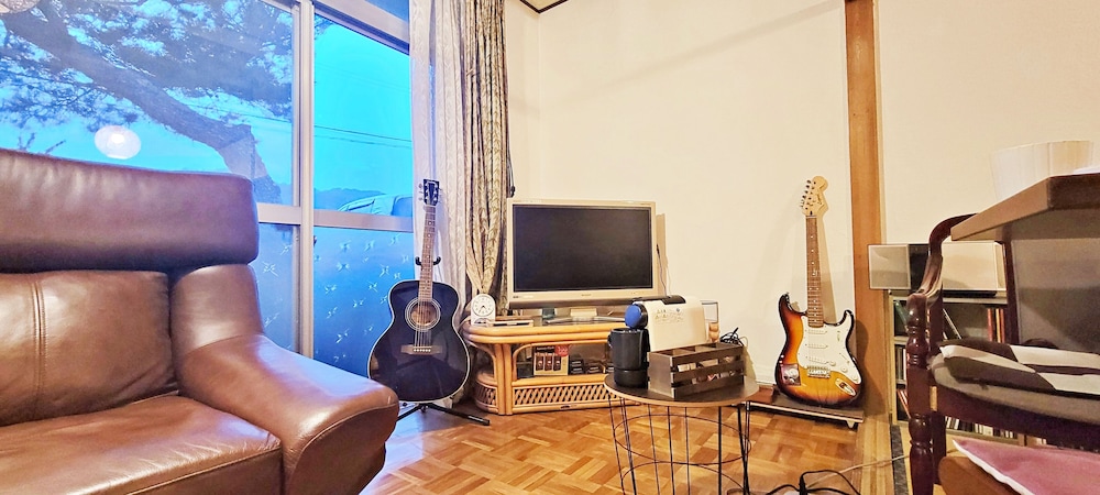 ベーシック トリプルルーム リビング エリア1 | ゲストハウス＆シェアハウス カリマ安曇沓掛