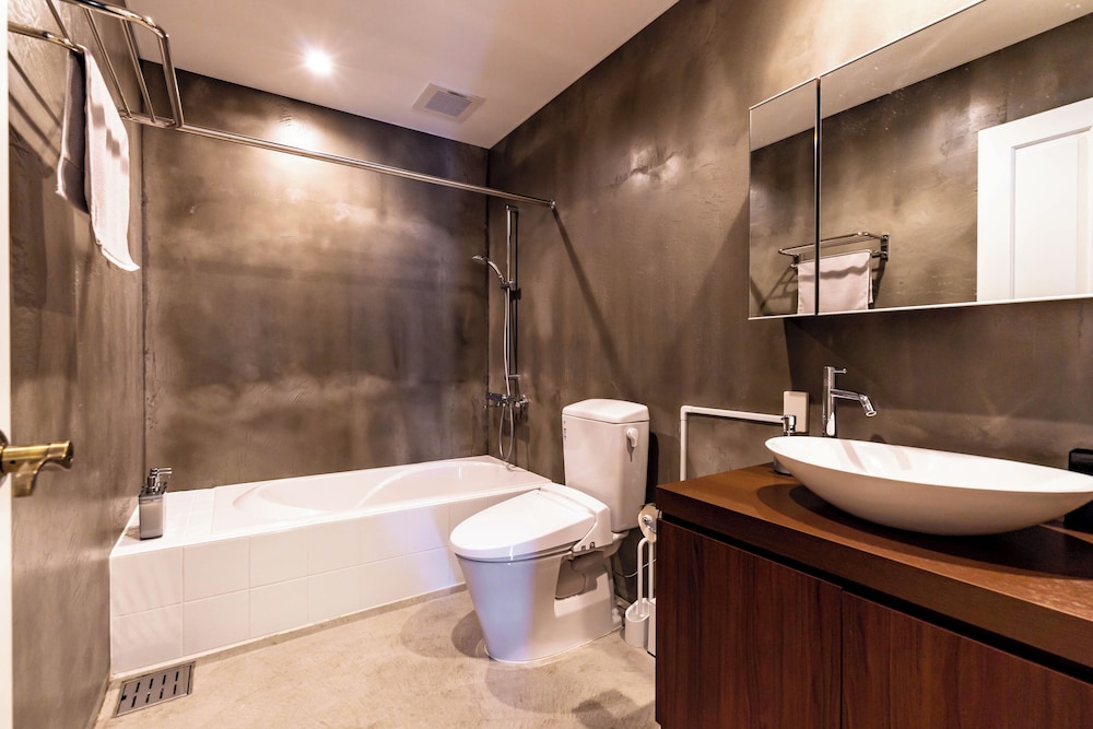 スーペリア ヴィラ オーシャンビュー バスルーム0 | ビーチフロントプール＆BBQテラス付の貸別荘 Anniversario