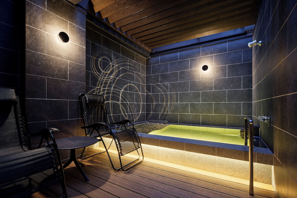 エグゼクティブ ダブルルーム キングベッド 1 台 禁煙 電子レンジ テラス / パティオ0 | 弥富ホテルNUQU全室天然温泉