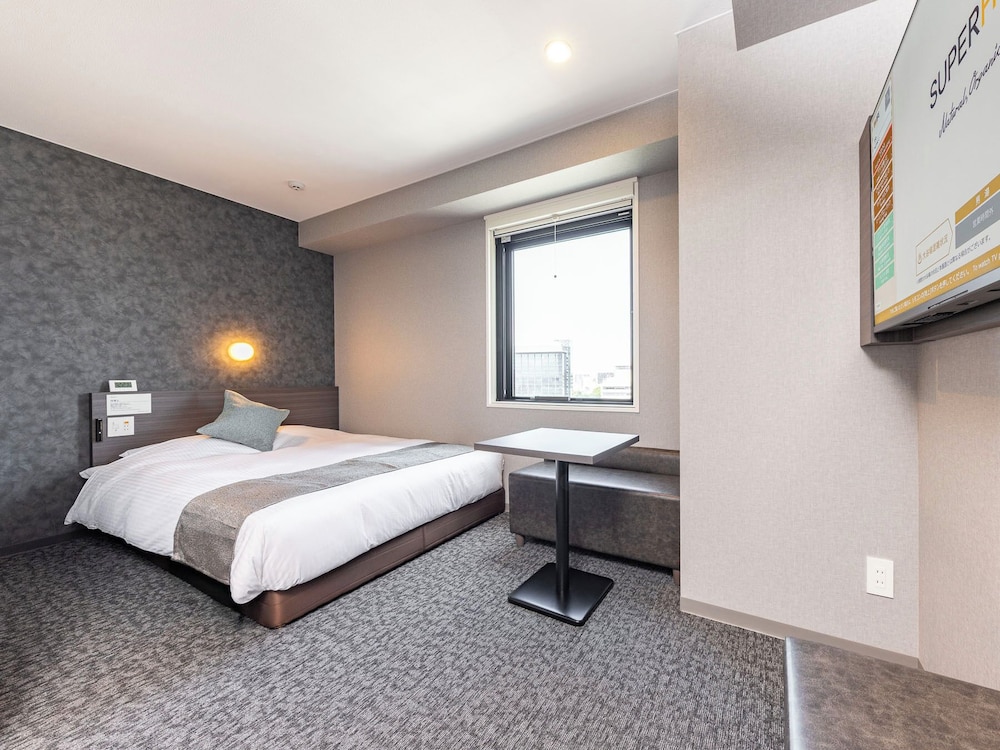 ダブルルーム ダブルベッド 1 台 禁煙 | 天然温泉スーパーホテルPremier 富山・城址公園前