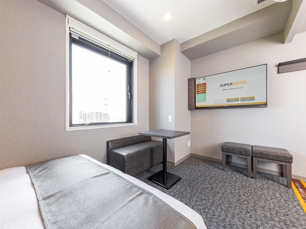 ダブルルーム ダブルベッド 1 台 禁煙 客室1 | 天然温泉スーパーホテルPremier 富山・城址公園前