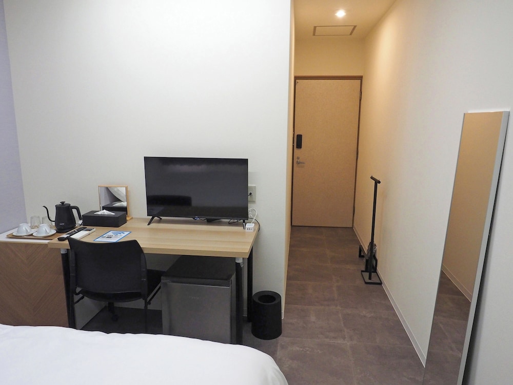 ベーシック ダブルルーム シティビュー 客室2 | マーケットステイ新宮
