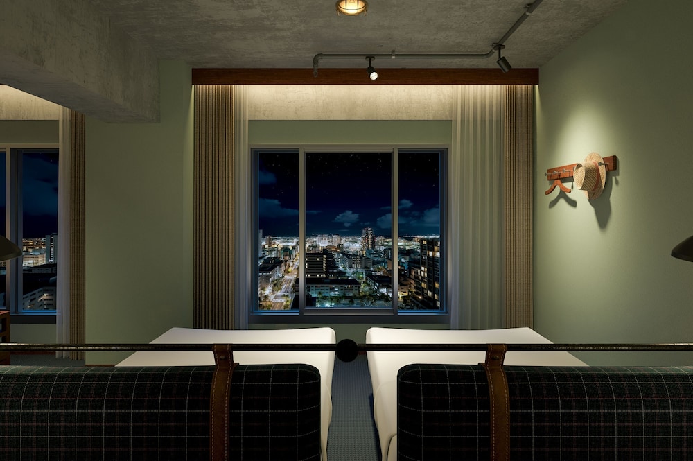 プレミアムコーナー シティサイド 禁煙 (2ベッドルーム/洗濯機) 客室1 | サウスゲートホテル沖縄