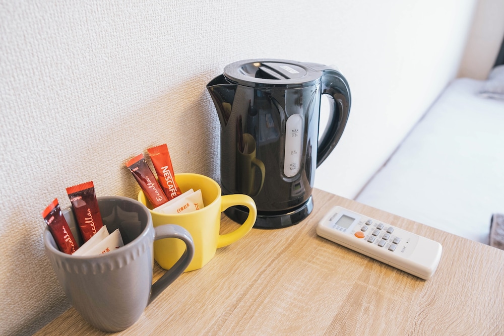 スタンダード ツインルーム バルコニー シティビュー コーヒー / コーヒーメーカー1 | 大阪イングリッシュハウス