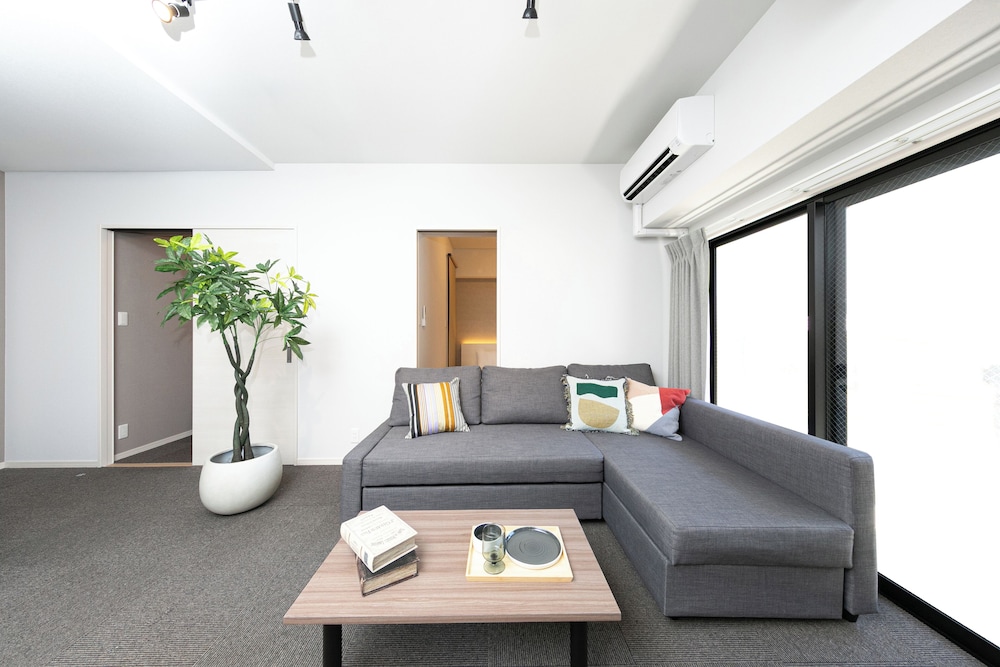 ファミリー スイート 禁煙 (901) リビング エリア3 | Living like Hotel 博多駅南