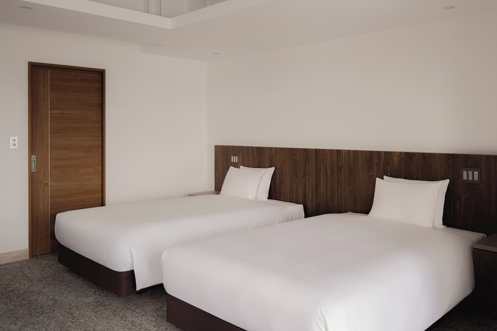 オーシャンスイートキング 66平米/バルコニー ジャグジー キッチン付 禁煙 客室2 | Anse Yomitan Toya