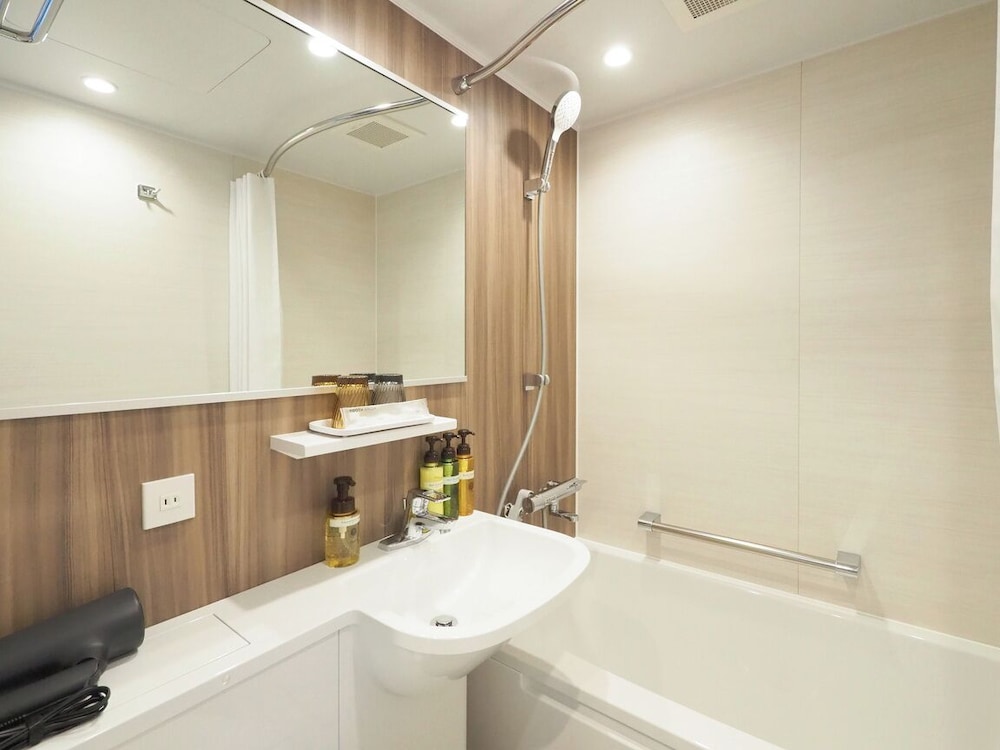 ダブルルーム洗濯機・電子レンジ付き 禁煙 バスルーム0 | たびのホテル石狩