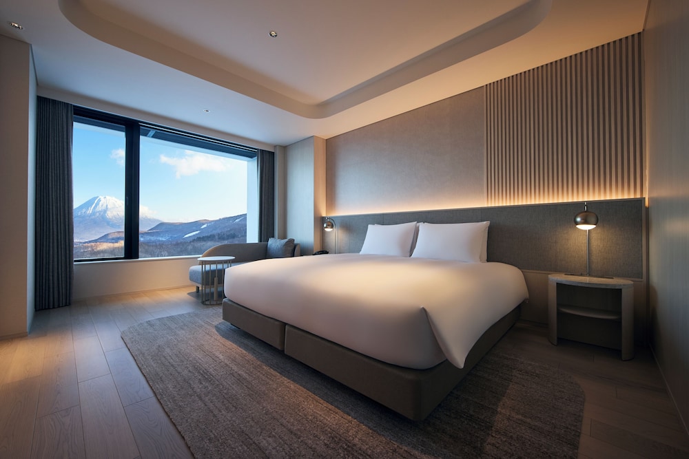 シグネチャー スイート 1 ベッドルーム マウンテンビュー 客室1 | シャレー アイビー ワイス