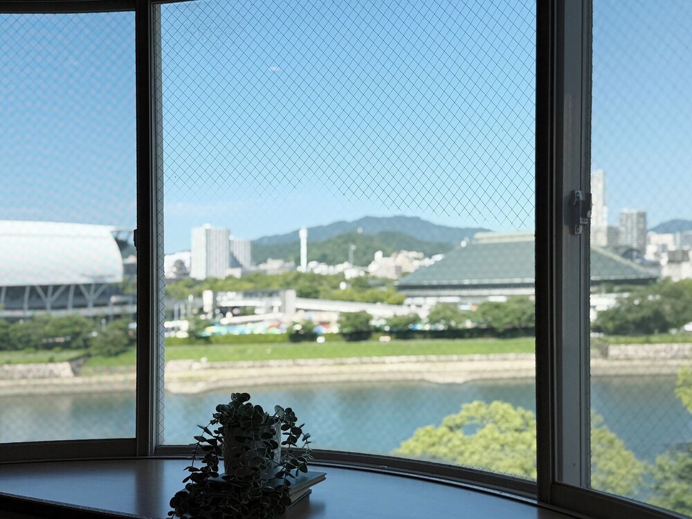 スーペリア アパートメント バルコニー リバービュー 部屋からの景観1 | Grandeur Hamamoto