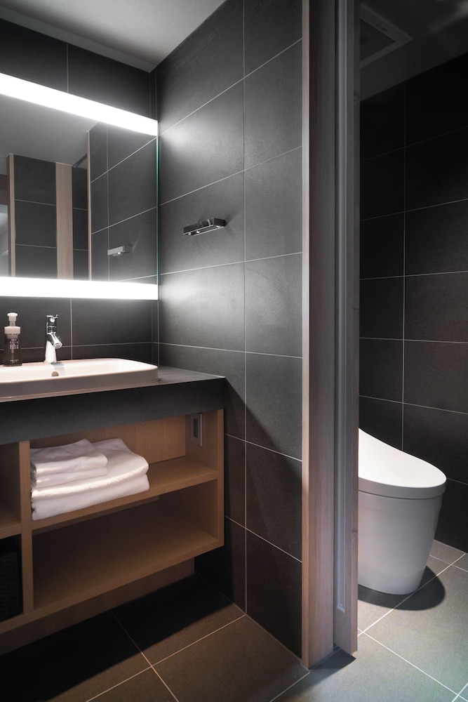 エグゼクティブ ダブルまたはツインルーム バスルーム0 | KIORI Hotel Takakura