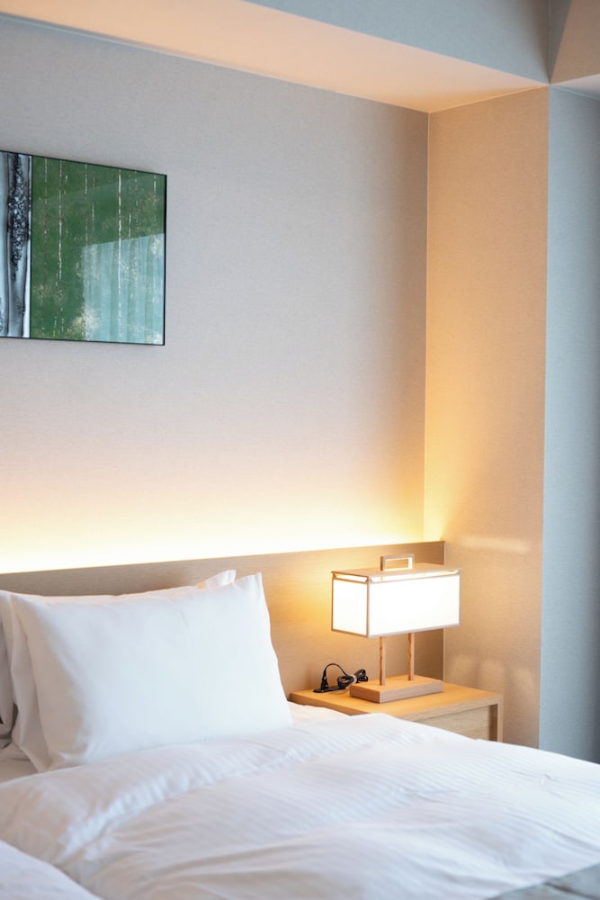 デラックス ダブルまたはツインルーム シティビュー 客室2 | KIORI Hotel Takakura