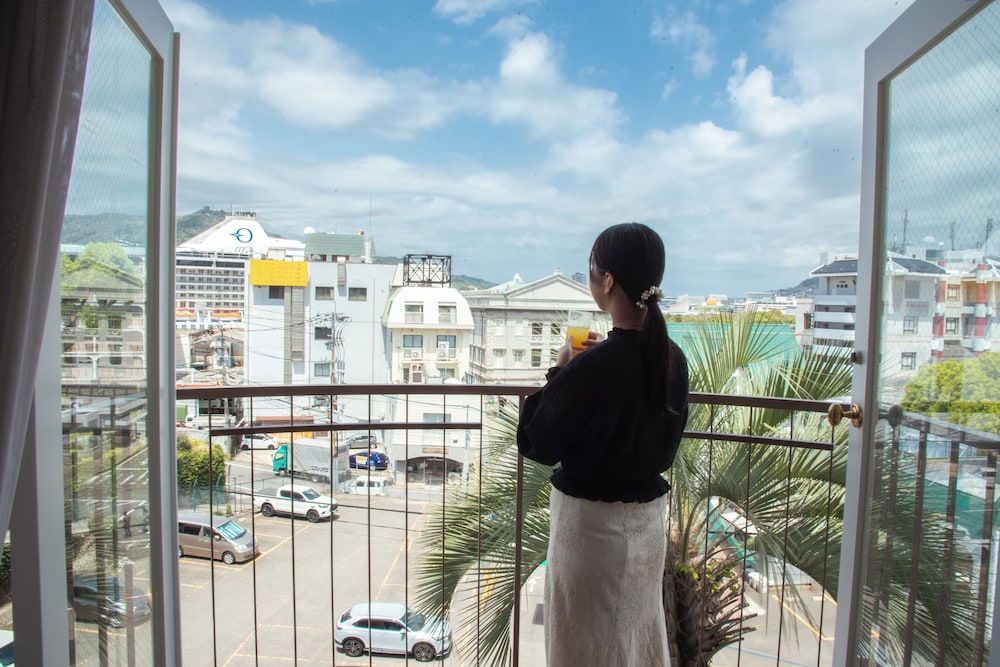 スタンダード ツインルーム バルコニー シティビュー テラス / パティオ0 | セトレグラバーズハウス長崎