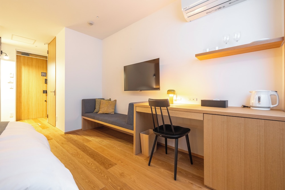 デラックス ダブルルーム 禁煙 リビング エリア0 | Dash Living Gojo