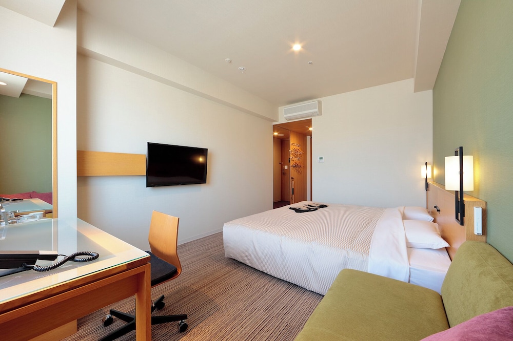 エクゼクティブソファキング 禁煙 客室1 | カンデオ ホテルズ松山大街道