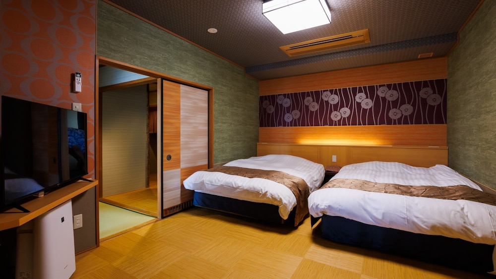 (嬉春亭) 露天風呂付和洋スイート (バイキング) 禁煙 客室1 | 戸田家