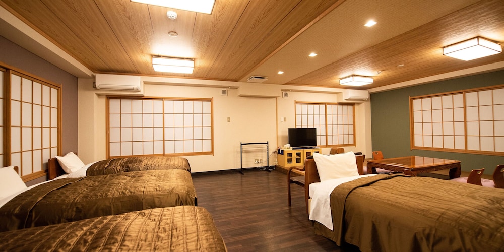スタンダード ルーム ベッド (複数台) | 信州湯田中温泉旅館はくら