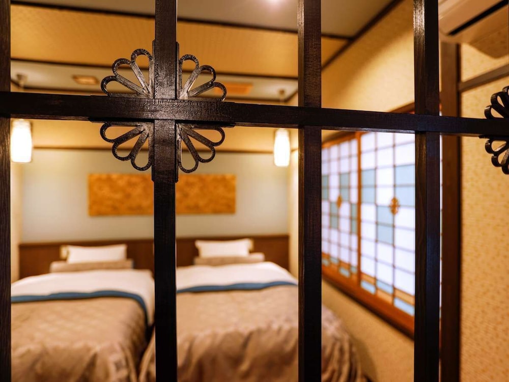 デザイン ルーム シングルベッド 2 台 客室2 | 城崎温泉 夢こやど 天望苑