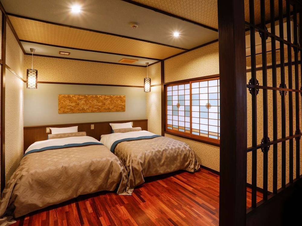 デザイン ルーム シングルベッド 2 台 客室1 | 城崎温泉 夢こやど 天望苑