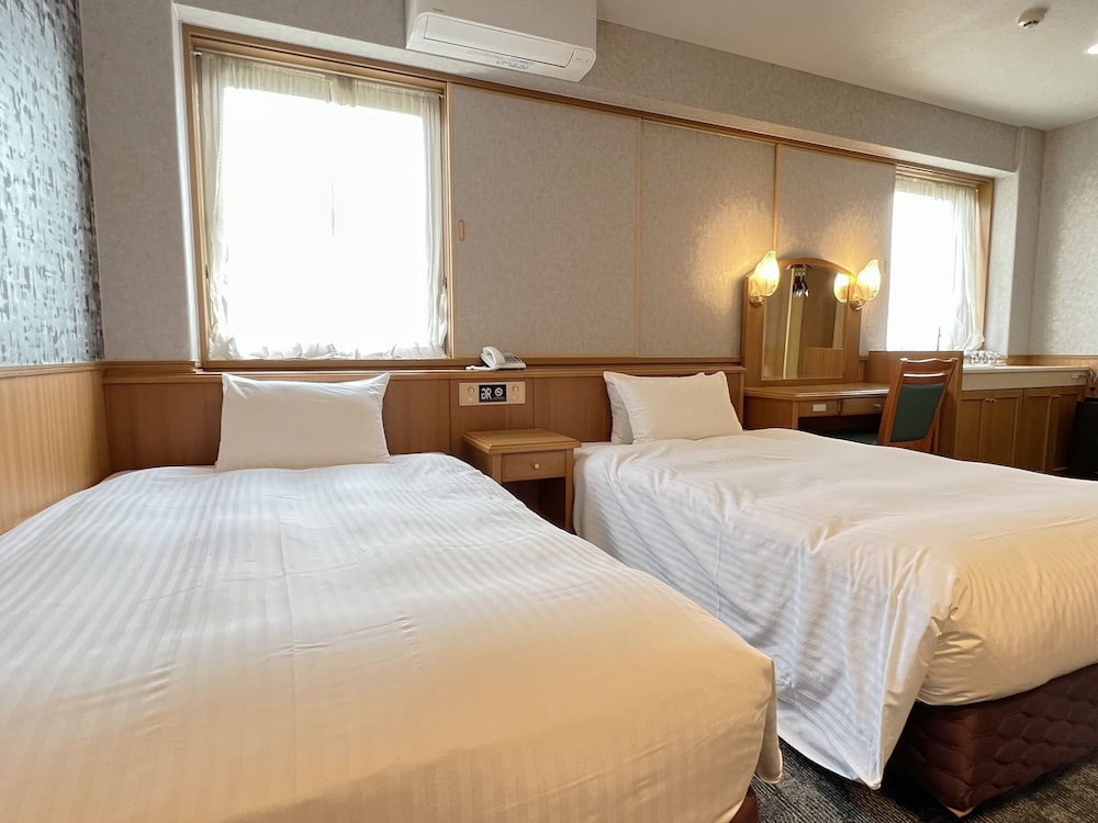 デラックスツインルーム 禁煙 (ファミリールーム対応) 客室1 | グリーンリッチホテルあそ熊本空港 人工温泉・二股湯の華