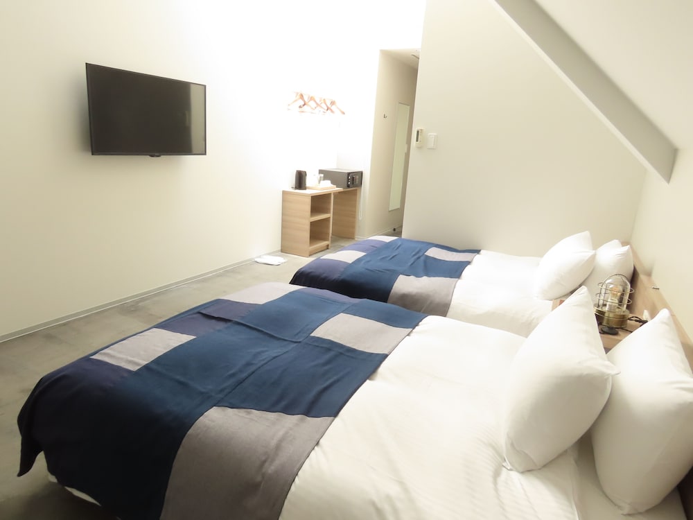 203 (禁煙)ペントハウスツイン(シャワーのみ) 客室2 | 大阪北港マリーナ HULL