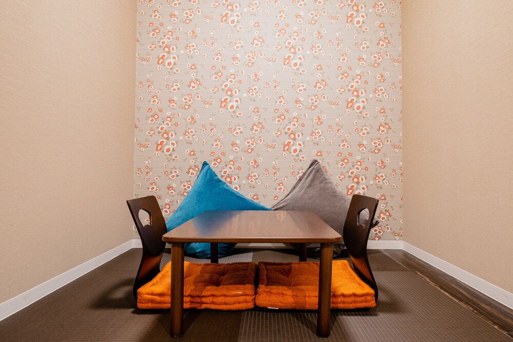 デラックス スイート 2 ベッドルーム リビング エリア0 | ホテル パゴダ