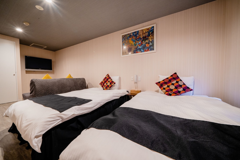 デラックス ツインルーム シングルベッド 2 台 客室2 | ホテル パゴダ