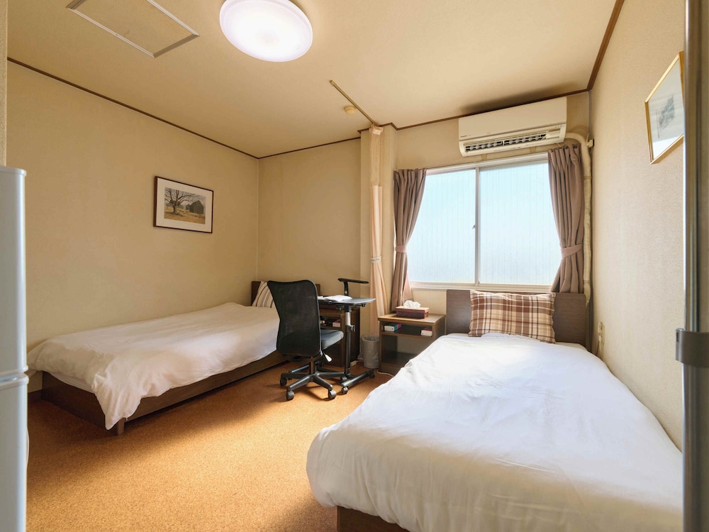 [喫煙可] ツインルーム (バス/トイレ共用) | Tabist ビジネスホテル寺本