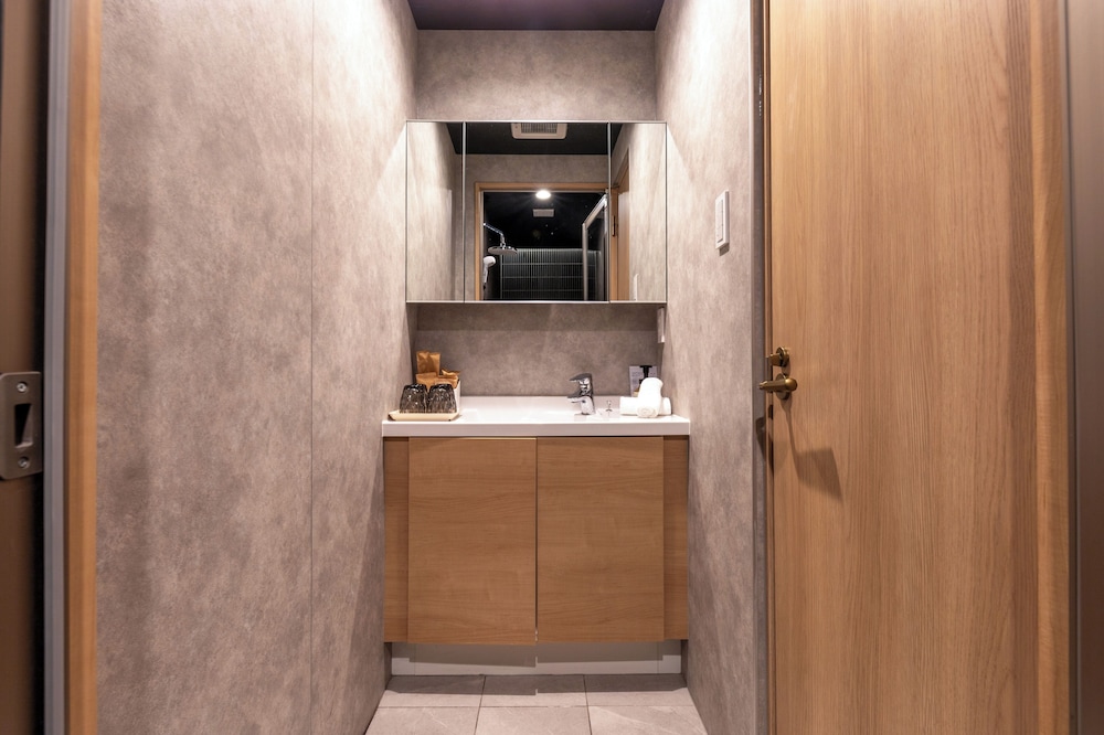 デラックス コンドミニアム ガーデンビュー バスルーム0 | Gouhou Graden hotel