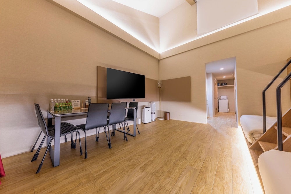 デラックス コンドミニアム ガーデンビュー リビングルーム0 | Gouhou Graden hotel