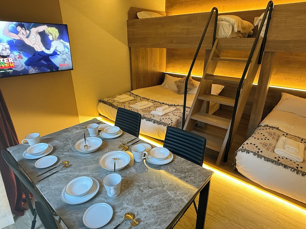 ファミリー 4 人部屋 ガーデンビュー 客室内のダイニングエリア0 | Gouhou Graden hotel