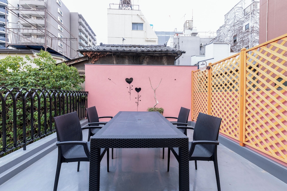 デラックス コンドミニアム ガーデンビュー テラス / パティオ0 | Gouhou Graden hotel