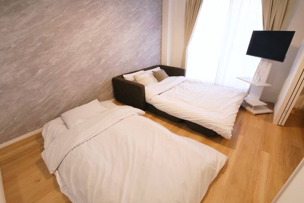 コンフォート アパートメント ベッド (複数台) 禁煙 バルコニー 201 リビング エリア5 | フォルモント寺田町