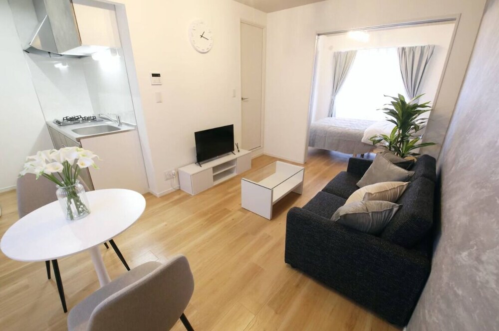 コンフォート アパートメント ベッド (複数台) 禁煙 バルコニー 203 リビング エリア7 | フォルモント寺田町