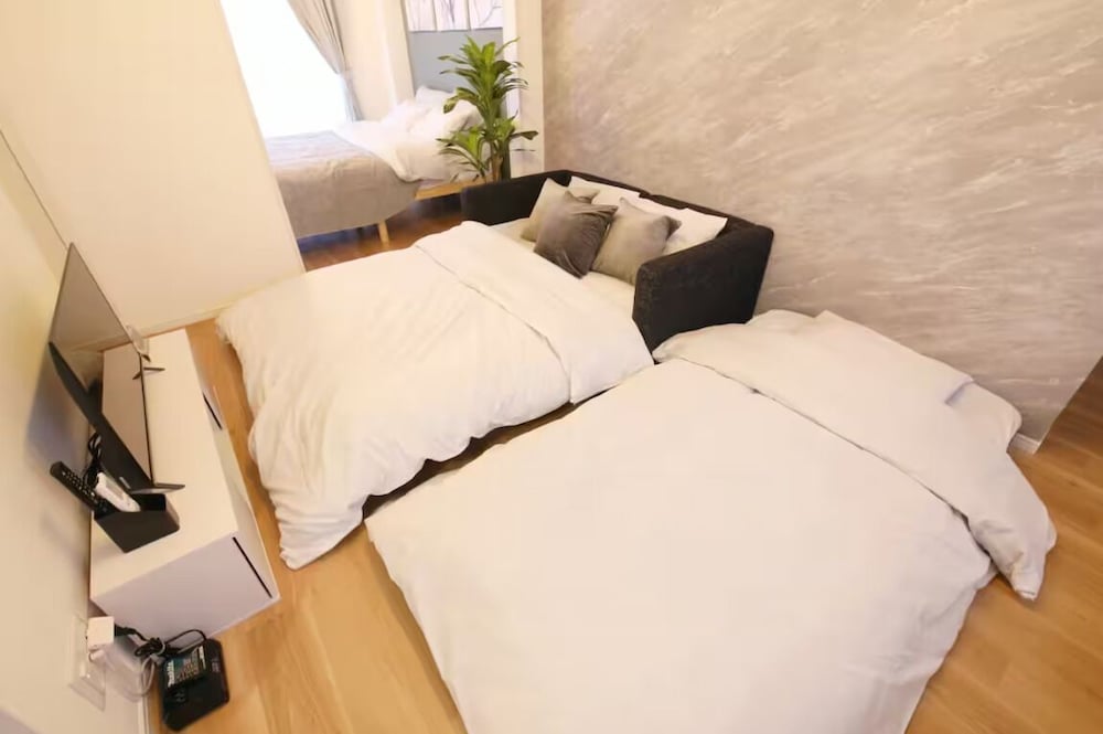 コンフォート アパートメント ベッド (複数台) 禁煙 バルコニー 203 リビング エリア10 | フォルモント寺田町