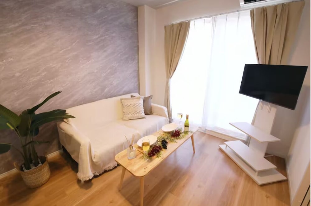 コンフォート アパートメント ベッド (複数台) 禁煙 バルコニー 201 リビング エリア1 | フォルモント寺田町